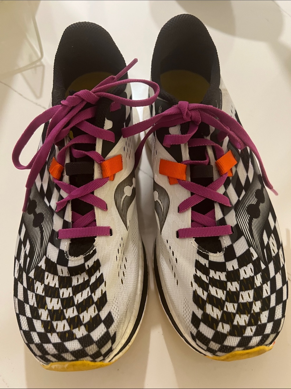Saucony Women's Black & White Running Shoes with Pink Laces and Orange Accents
